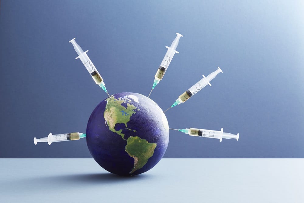 world-globe-with-syringes-vaccination-the-Americas